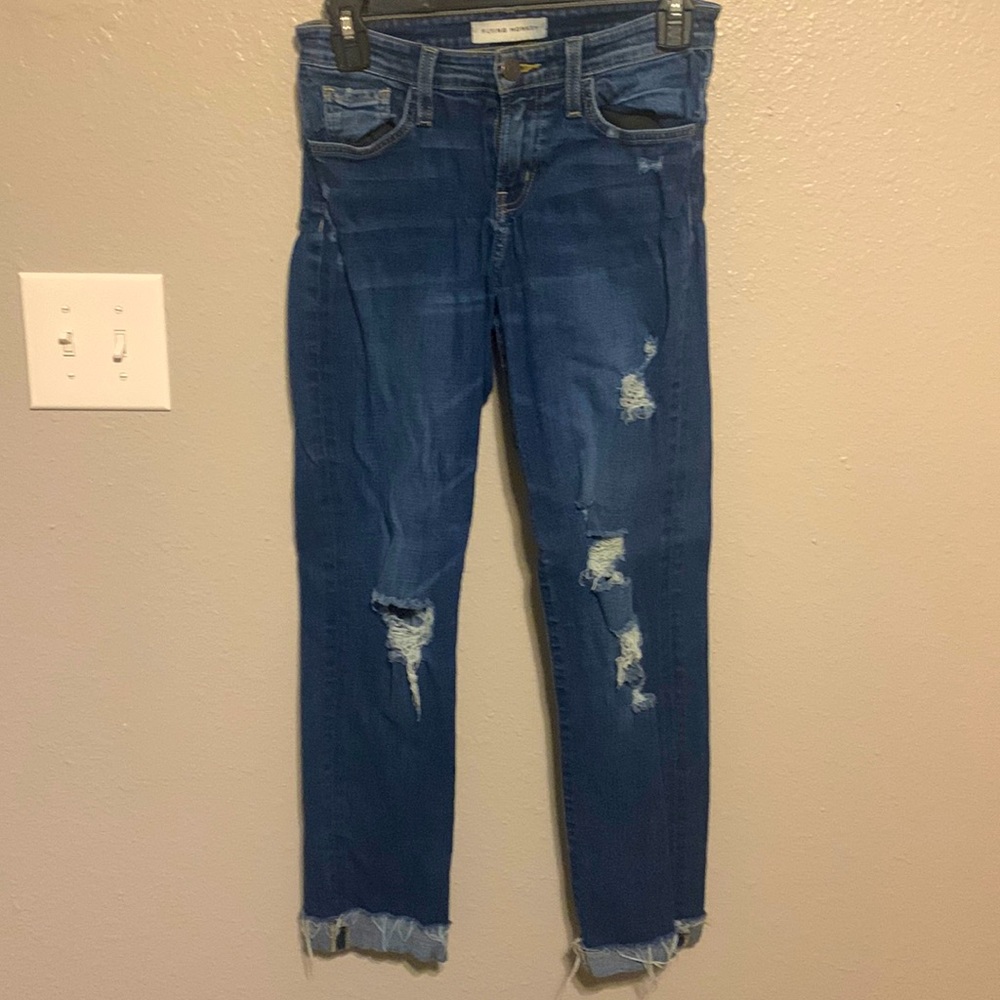 Floating monkey distressed jeans